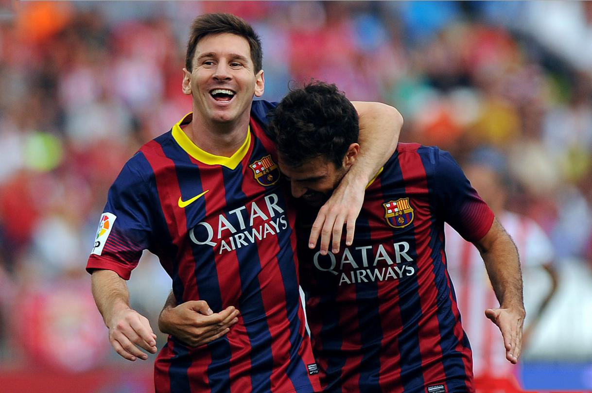 Lionel Messi big smile and hug to Cesc Fabregas, in Almeria 0-1 Barcelona