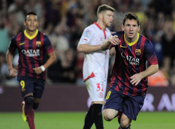 Lionel Messi runs to the TV camera direction, to dedicate his goal to his son