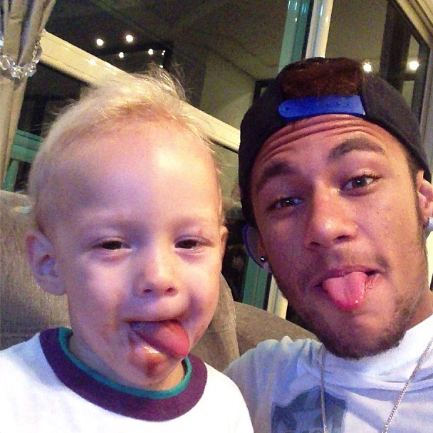 Neymar and son making silly faces to the camera