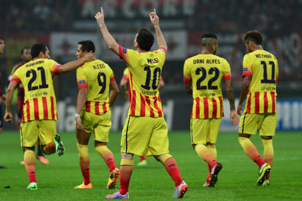 Barcelona players wearing the new away Barcelona jersey 2013-2014, in yellow and red stripes