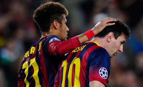 Neymar putting his hand on Messi hair