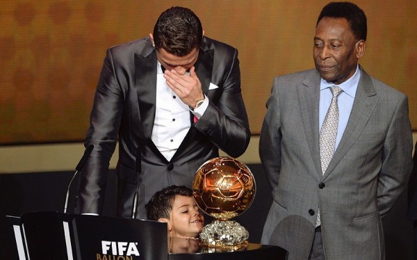 Cristiano Ronado next to his son, durnig the speech for the FIFA Ballon d'Or 2013