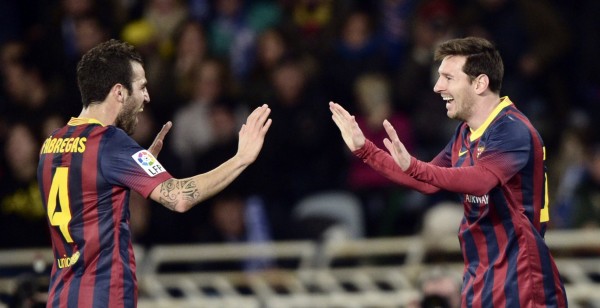 Cesc Fabregas and Lionel Messi