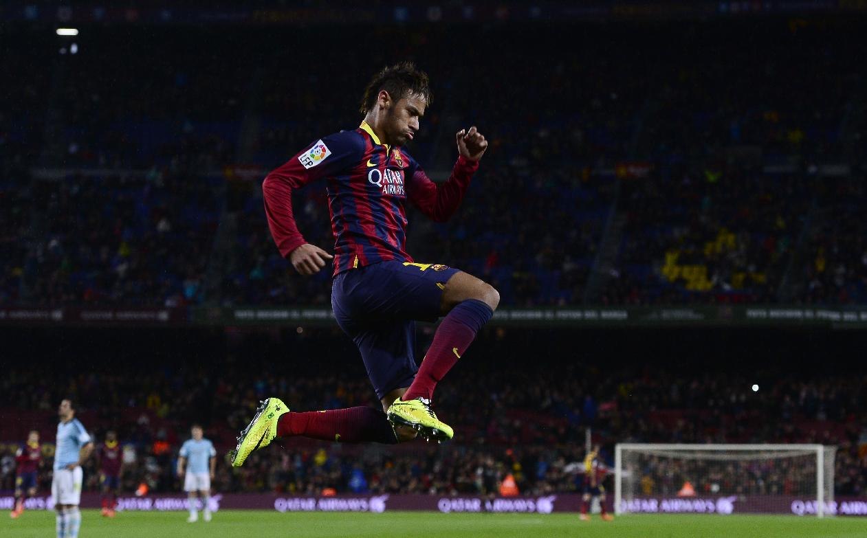 Neymar jumping in a Barcelona game