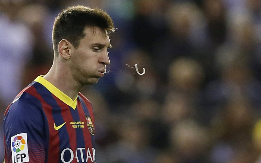 Lionel Messi spitting