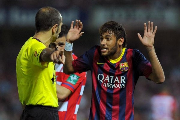 Neymar claiming innocence to the referee