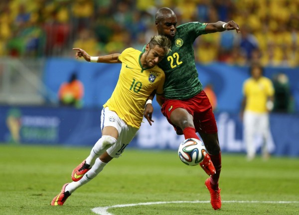 Neymar body strength and balance in Brazil's FIFA World Cup 2014