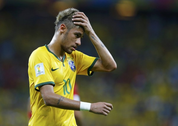 Neymar combing his new hair at the FIFA World Cup 2014