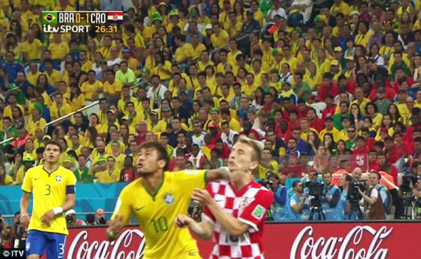 Neymar throwing his elbow at Luka Modric and being shown the yellow card