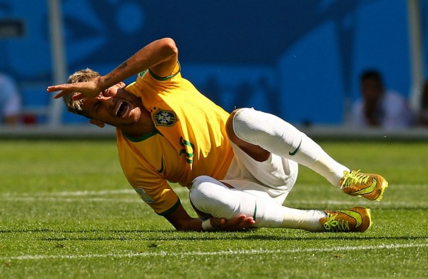 Neymar injured on his right leg, at the FIFA World Cup 2014