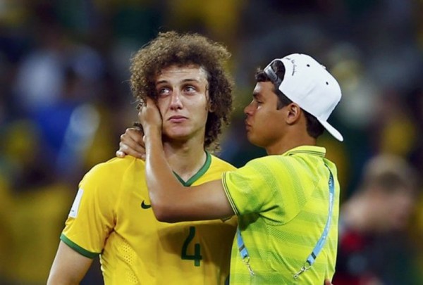 David Luiz crying and Thiago Silva comforting him