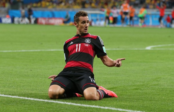 Miroslav Klose sliding knee goal celebration, in Brazil 1-7 Germany
