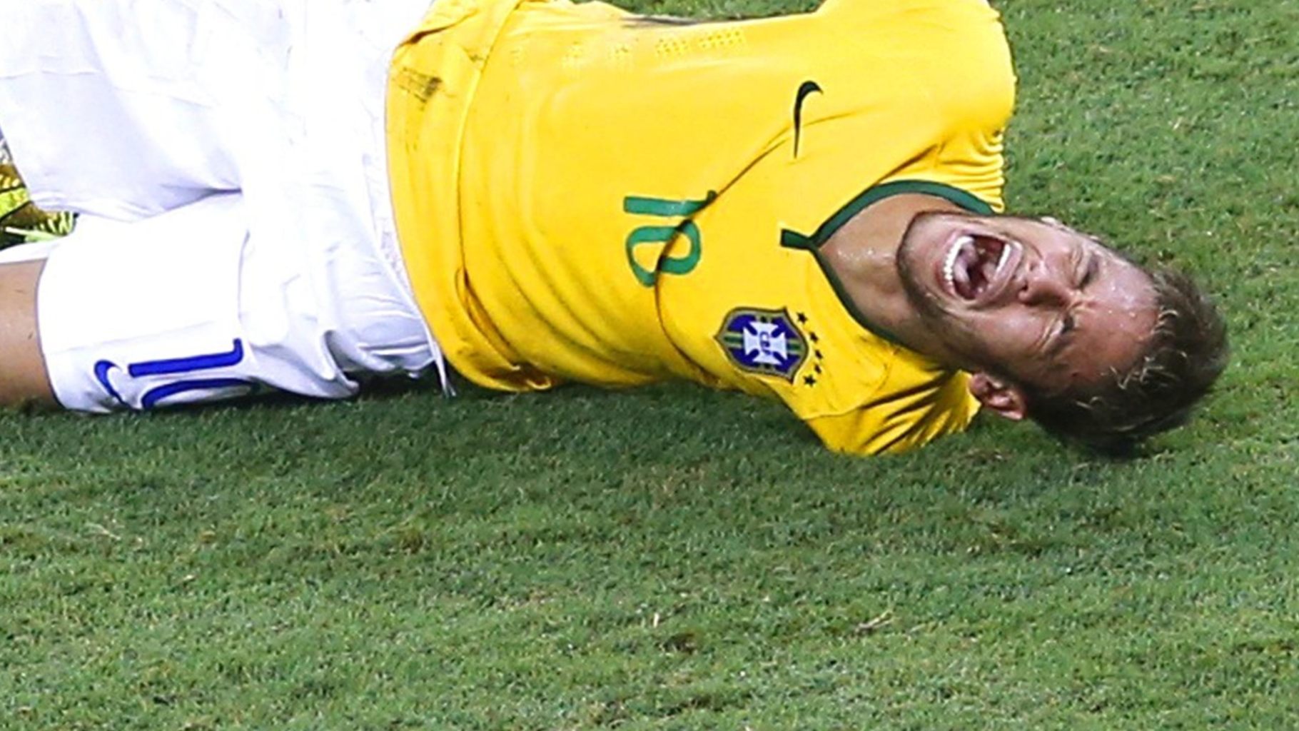 Neymar in pain after his injury in the 2014 FIFA World Cup
