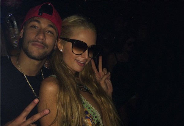 Neymar having fun with Paris Hilton in Ibiza