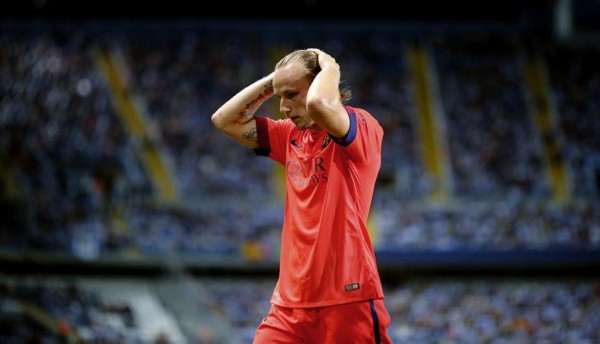 Ivan Rakitic pulling his hair back, in FC Barcelona 2014-2015