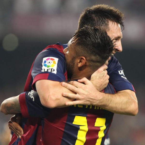 Lionel Messi hugging Neymar