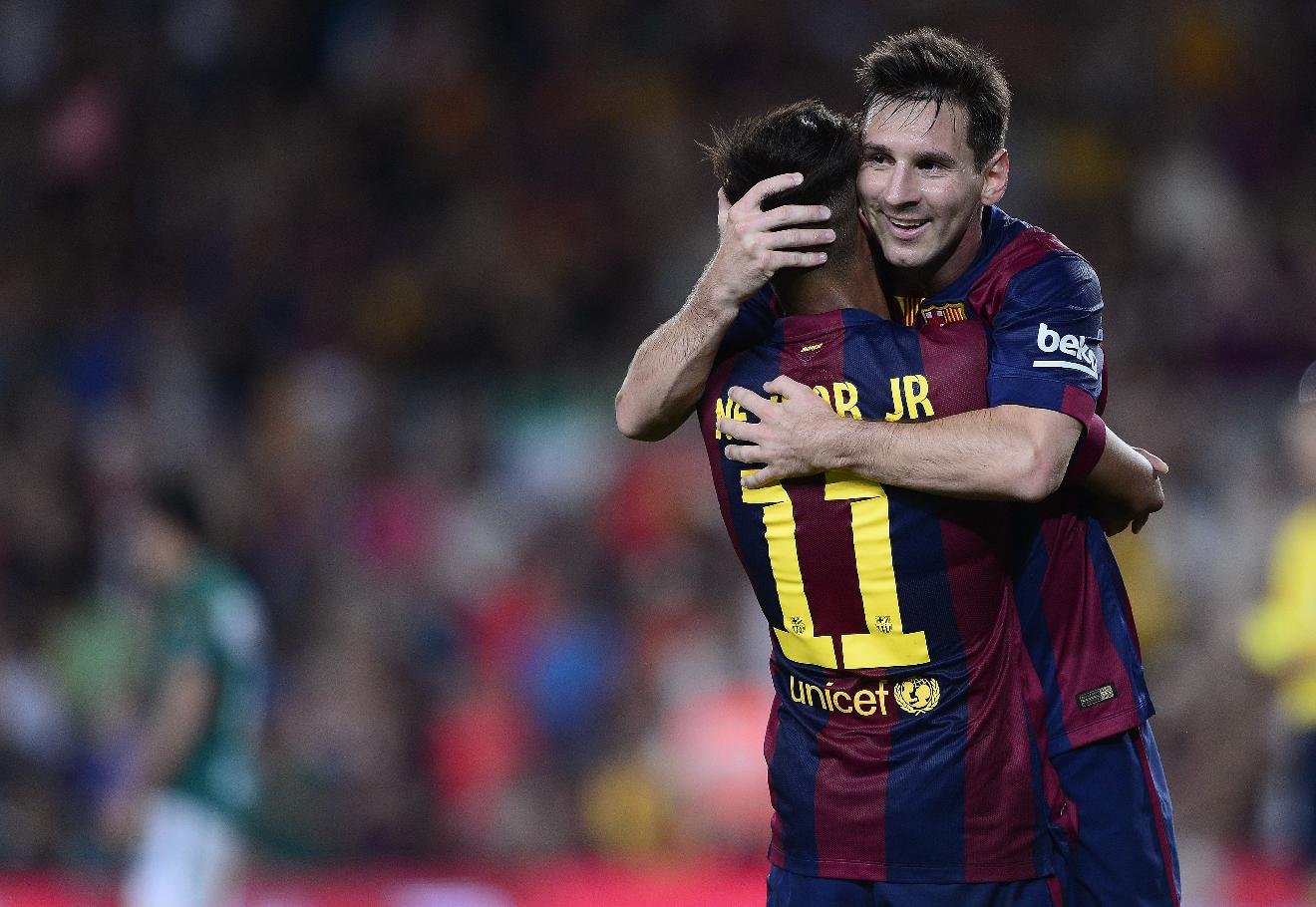 Neymar hugging Lionel Messi