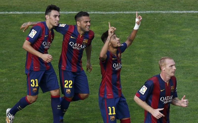 Neymar pointing to the sky, after scoring a goal