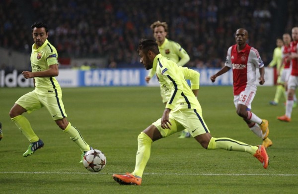 Neymar taking the ball forward in Ajax 0-2 Barcelona