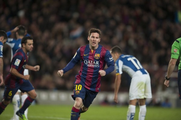 Lionel Messi scores a goal for Barcelona in La Liga 2014-2015