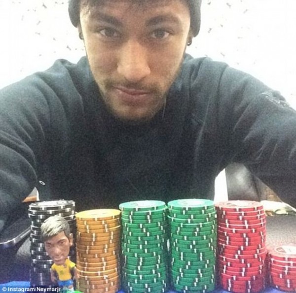Neymar with poker chips in front of him