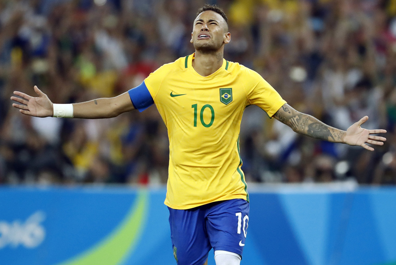 Neymar in 2016 Olympics in Rio, playing for the Brazilian National Team