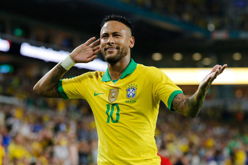 Neymar looking happy with the Brazilian National Team