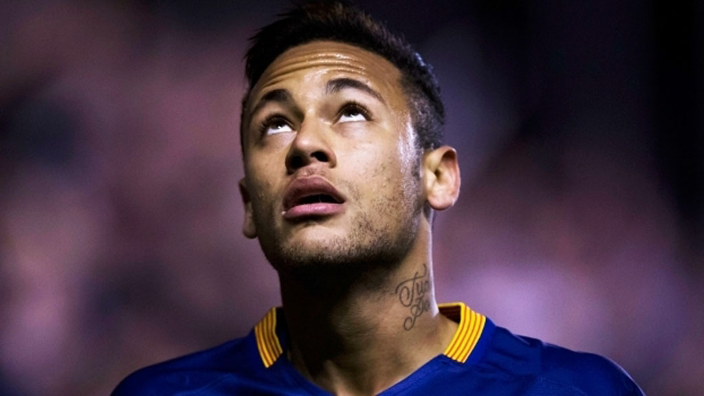 Neymar looking to the sky while playing for Barcelona