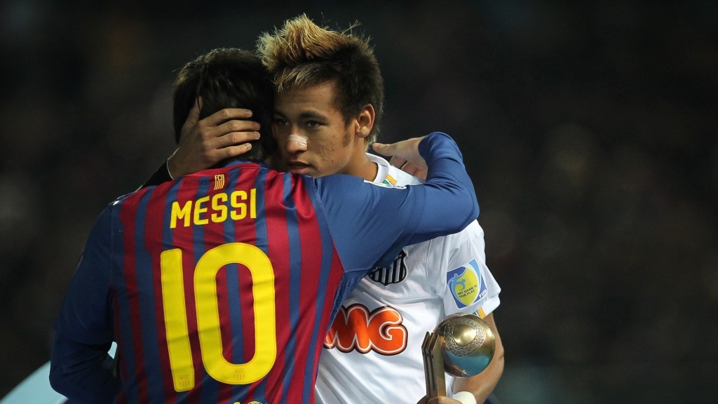 Neymar and Lionel Messi hugging each other