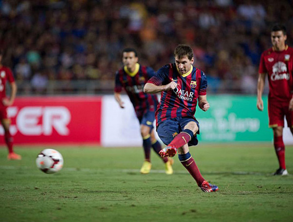 Lionel Messi scoring a goal for Barcelona