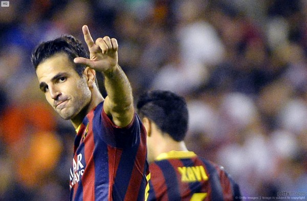 Cesc Fabregas making a curious hand gesture, after scoring for Barcelona