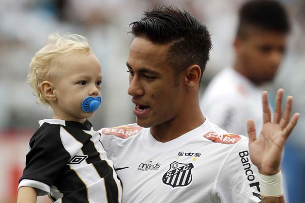 Neymar and his son David Lucca, ahead of a Santos game