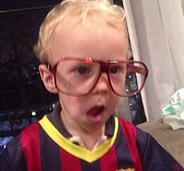 Neymar son David Lucca wearing a Barcelona jersey