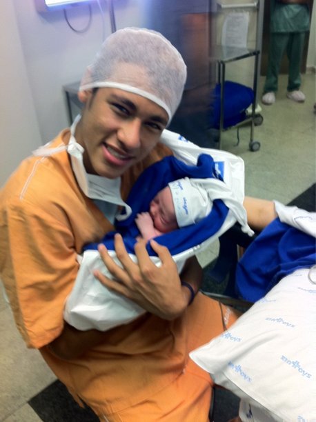 Neymar with his baby son David Lucca da Silva Santos, at the hospital