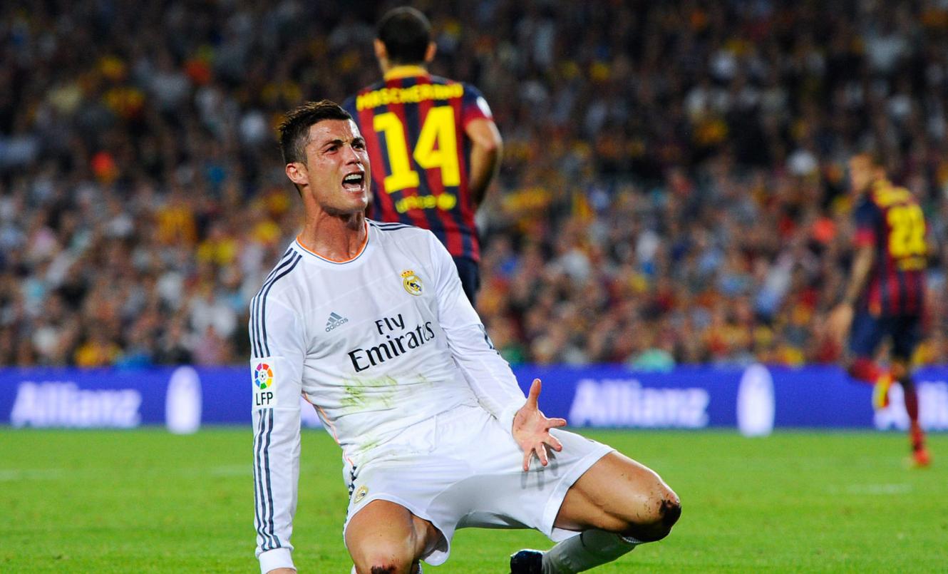 Cristiano Ronaldo on his knees at the Clasico Barcelona vs Real Madrid