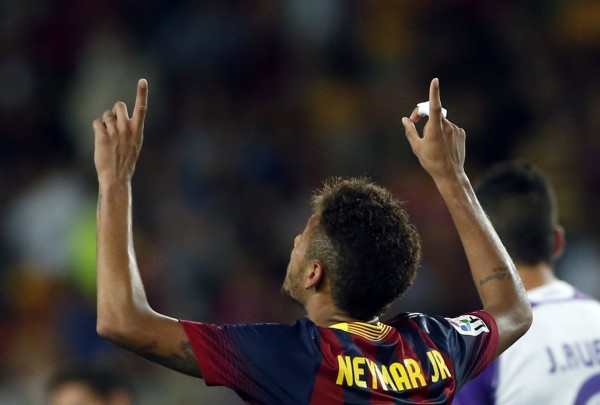 Neymar thanking God after scoring a goal for Barcelona