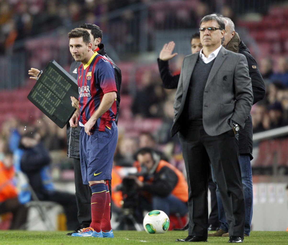 Lionel Messi about to come in, on his return after injury