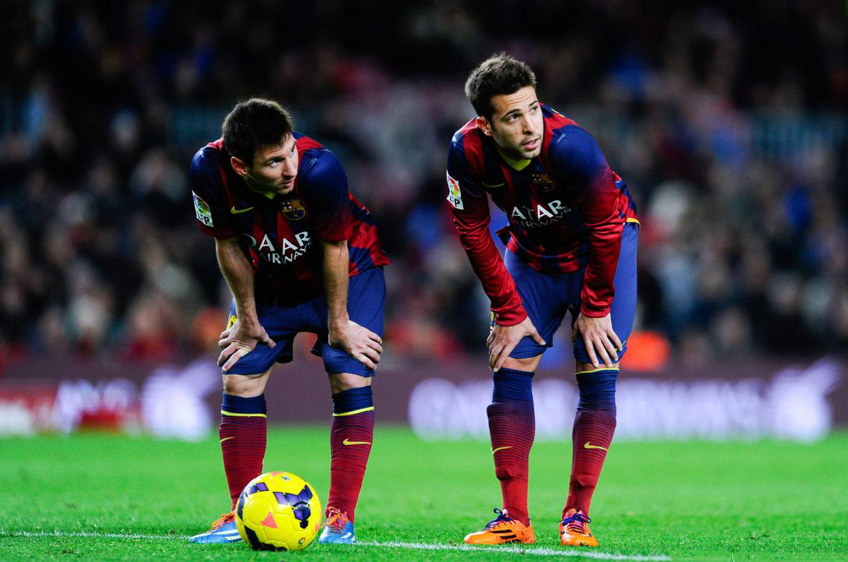 Messi and Jordi Alba leaned down