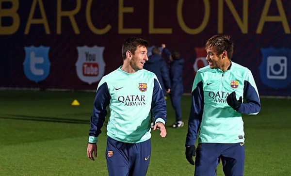 Messi and Neymar talking to each other, at a training session