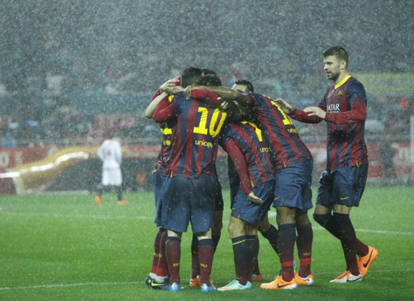 Barcelona team players celebrating goal in 2014