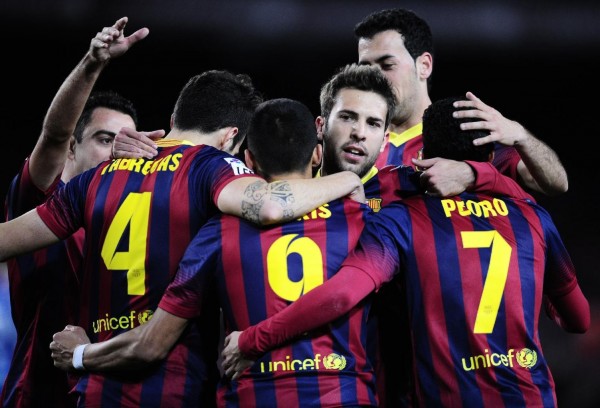 Barcelona team players gathering to celebrate goal