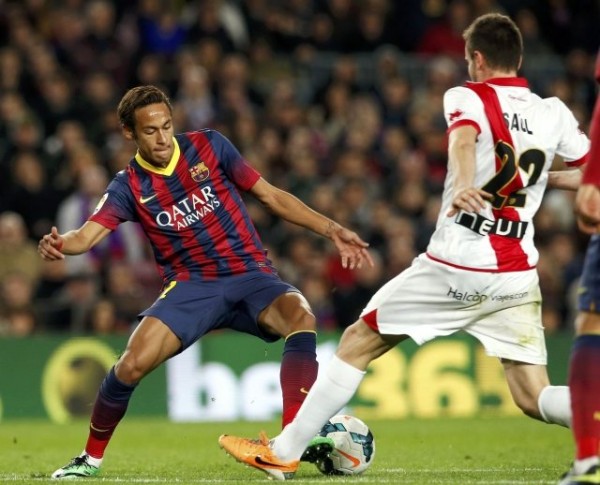 Neymar dribbling in a Barcelona game