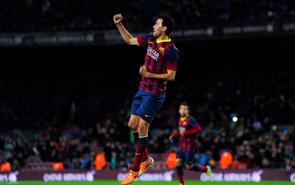 Sergio Busquets jumping to celebrate his goal for Barcelona