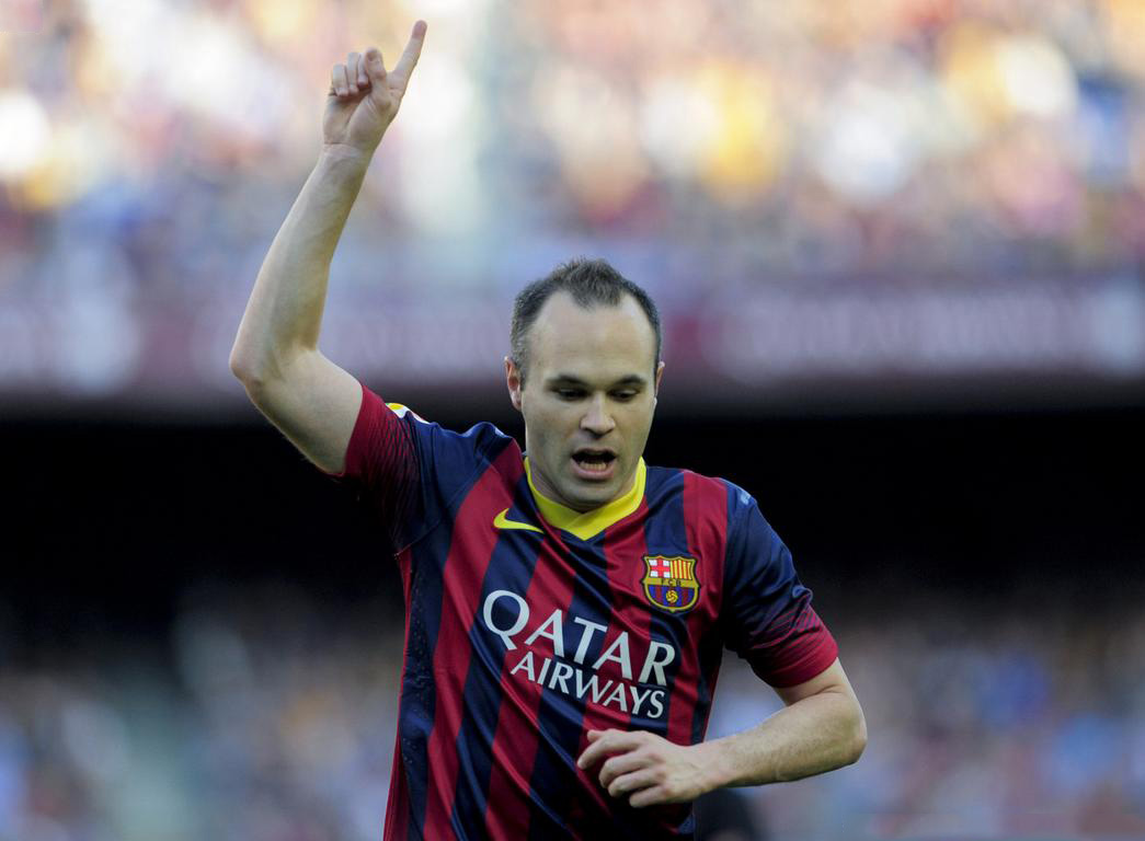 Andrés Iniesta raising his finger to the sky to dedicate his goal to his decesead son