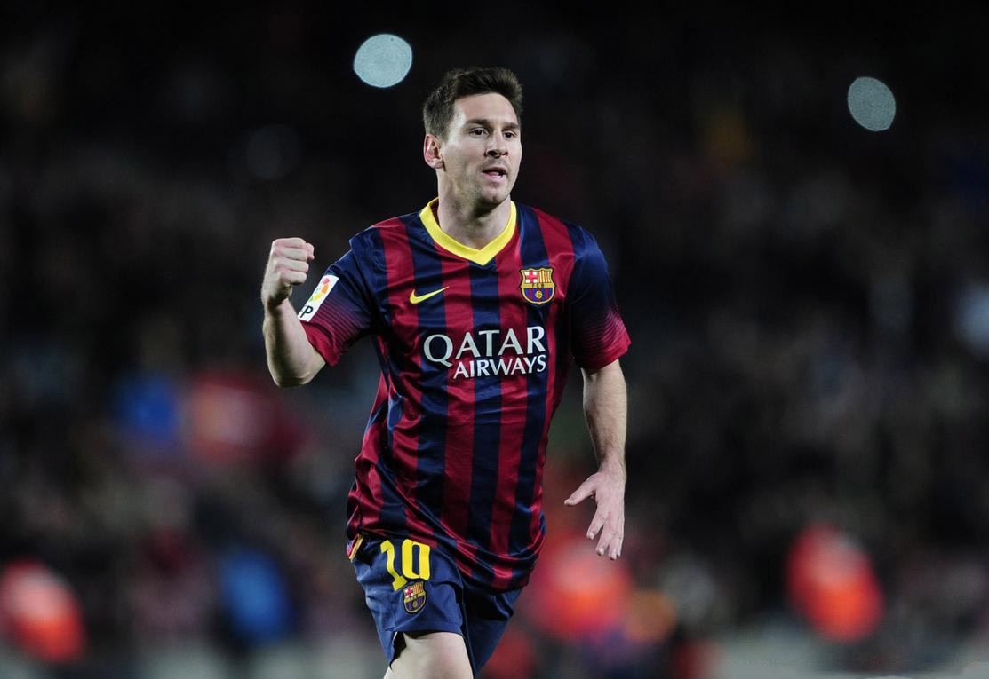 Lionel Messi celebrates a goal for Barcelona