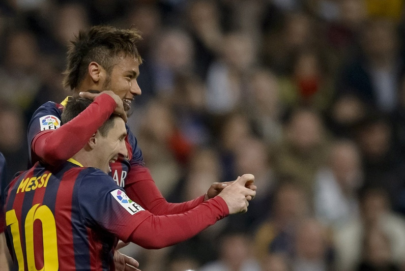Neymar and Lionel Messi celebrating win over Real Madrid in Clasico