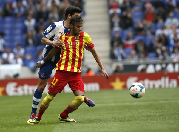 Neymar being pulled by his Barcelona jersey