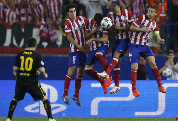 Lionel Messi hitting Atletico's wall on a free-kick