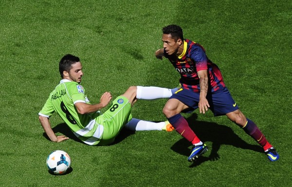 Adriano dribbling an opponent