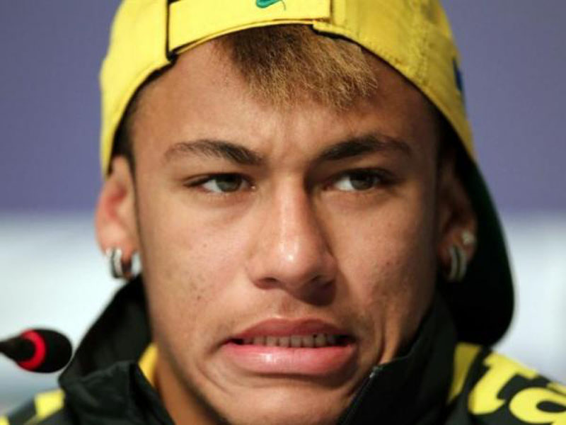Neymar wearing a cap during a press conference in Brazil